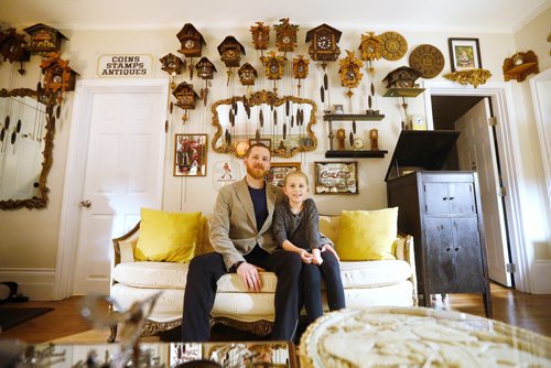 JOHN WOODS / WINNIPEG FREE PRESS
Murray Beilby is photographed with his daughter Livia, 9, amongst some of his clock collection Tuesday, November 12, 2018.