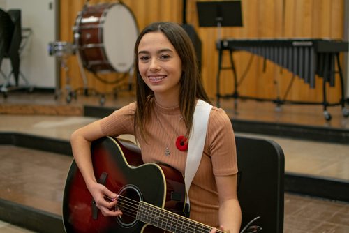 Canstar Community News Nov. 6  Tec Voc student Heidi Wright wrote an original song for Remembrance Day titled, "The Boys of Valour Road." (EVA WASNEY/CANSTAR COMMUNITY NEWS/METRO)