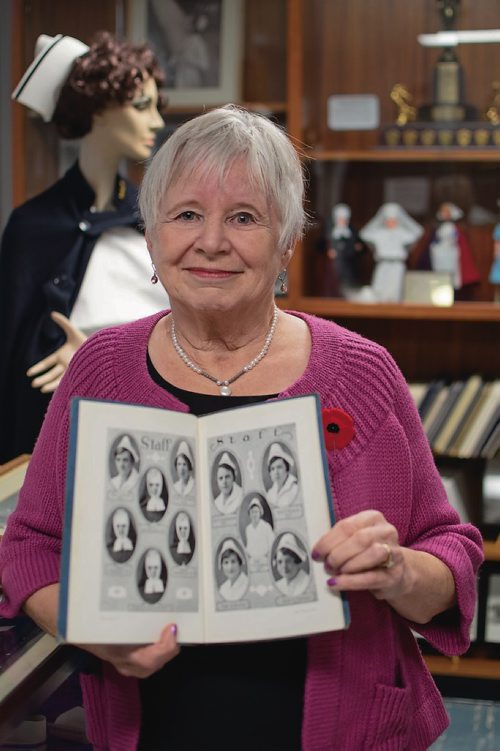 Canstar Community News Nov. 7 - Misericordia Health Centre's Agnes Wilkie was the only nurse killed in action during the Second World War. Dr. Barbra Paterson holds a photo of Wilkie's graduating class from the Misericordia School of Nursing. (EVA WASNEY/CANSTAR COMMUNITY NEWS/METRO)