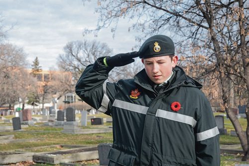 Canstar Community News Maguire Brophy salutes a soldier's grave. Members of Winnipeg's Princess Patricia's Canadian Light Infantry Cadet Corps visited the St. James Cemetary on Nov. 3 to place Canadian flags on the graves of more than 60 First World War soldiers. (EVA WASNEY/CANSTAR COMMUNITY NEWS/METRO)