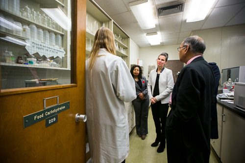 MIKAELA MACKENZIE / WINNIPEG FREE PRESS
Kirsty Duncan, Minister of Science and Sport, gets some of the research happening in Trust Beta's grains lab explained to her by PhD student Pamela Drawbridge after announcing national investments in the Canada Research Chairs Program at the University of Manitoba in Winnipeg on Wednesday, Nov. 14, 2018. 
Winnipeg Free Press 2018.