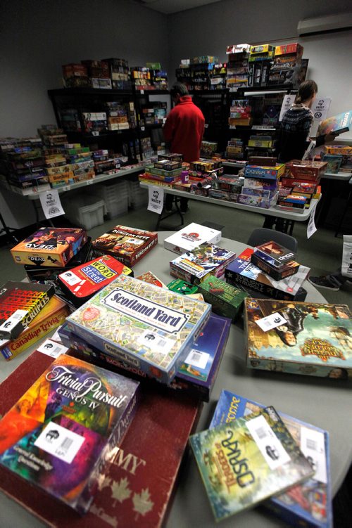 PHIL HOSSACK / WINNIPEG FREE PRESS - Gamers make their selection from the vault of games at the Inaugural Game-iToba convention (board games) goes Friday till Sunday at the Bronx Park Community Centre, 720 Henderson Hwy. - November 17, 2018