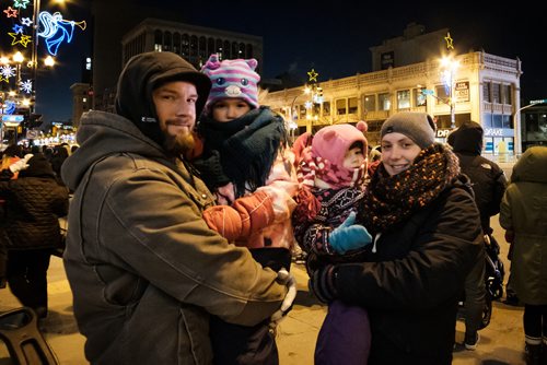 Daniel Crump / Winnipeg Free Press. Gord and Maegan May, with daughters Kaelie (middle left) and Ember (middle right) attend the Santa Claus Parade as a family every year. November 17, 2018.
