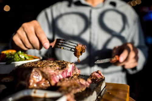 MIKAELA MACKENZIE / WINNIPEG FREE PRESS
The bone-in ribeye steak is seared in the kitchen, then cut into bite-sized pieces by the customer at the table and cooked on the hot lava rock at Lot 88 in Winnipeg on Friday, Nov. 16, 2018.
Winnipeg Free Press 2018.