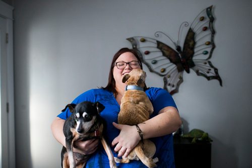 MIKAELA MACKENZIE / WINNIPEG FREE PRESS
Foster mom Erin Skobel with Abbey (a 13-year-old miniature pinscher), left, and Charlie (a 12-year-old male chihuahua), who need to be adopted out together, in her home in Winnipeg on Tuesday, Nov. 20, 2018.
Winnipeg Free Press 2018.