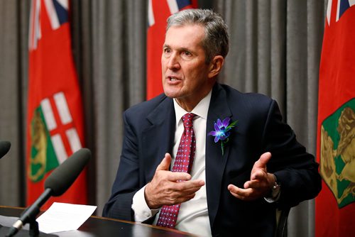 Manitoba premier Brian Pallister speaks to media after the reading of the throne speech at  the Manitoba Legislature in Winnipeg, Tuesday, November 20, 2018.   THE CANADIAN PRESS/John Woods