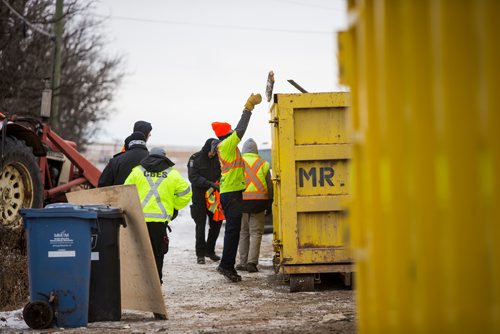 MIKAELA MACKENZIE / WINNIPEG FREE PRESS
Cleanup crews remove debris from a south St. Vital farm in Winnipeg on Wednesday, Nov. 21, 2018.
Winnipeg Free Press 2018.