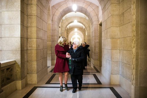 MIKAELA MACKENZIE / WINNIPEG FREE PRESS
Minister Cathy Cox holds survivor Luba Semaniuk's arm as they walk down the hall to commemorate the 85th anniversary of the end of the Holodomor, a famine genocide that claimed millions of lives in Ukraine between 1932 and 1933, at the Manitoba Legislative Building in Winnipeg on Thursday, Nov. 22, 2018.
Winnipeg Free Press 2018.