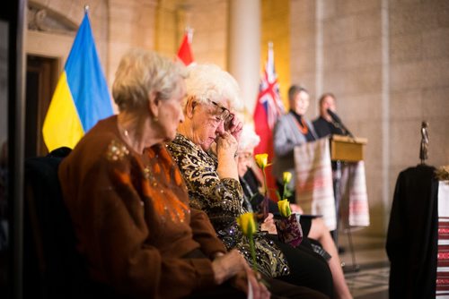 MIKAELA MACKENZIE / WINNIPEG FREE PRESS
Survivor Luba Semaniuk wipes her eyes at a gathering to commemorate the 85th anniversary of the end of the Holodomor, a famine genocide that claimed millions of lives in Ukraine between 1932 and 1933, at the Manitoba Legislative Building in Winnipeg on Thursday, Nov. 22, 2018.
Winnipeg Free Press 2018.