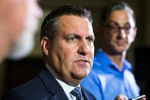 MIKAELA MACKENZIE / WINNIPEG FREE PRESS
Minister Cliff Cullen scrums at the Manitoba Legislative Building in Winnipeg on Thursday, Nov. 22, 2018.
Winnipeg Free Press 2018.