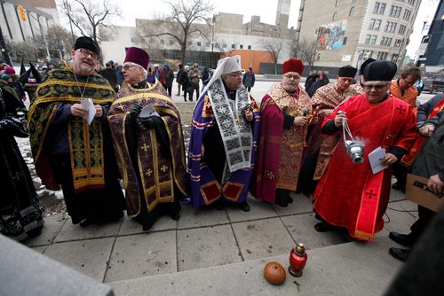 PHIL HOSSACK / WINNIPEG FREE PRESS - Officials from the Ukrainian Orthodox and Ukrainian Catholic Churches gather in front of the Memorial at City Hall as members of Winnipeg's Ukrainian Community gather Saturday to mark Ukrainian Famine and Genocide (Holodomor) Memorial Day.   Alex Paul story. - November 24, 2018