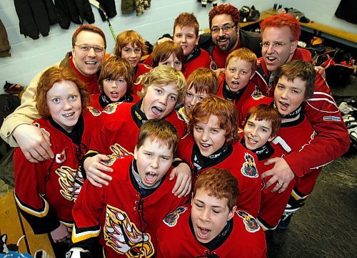 BORIS MINKEVICH / WINNIPEG FREE PRESS 090322 The Fort Garry Red 11 year old hockey team shows off their red hair before a playoff game at Maples Arena. The team and their coaches turn red heads for the festive playoff season.