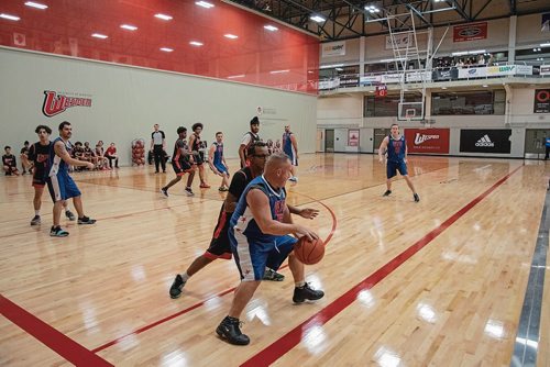 Canstar Community News Nov. 19 - The University of Winnipeg Collegiate varsity boys basketball team took on the Winnipeg Police Service team in a charity match to raise funds for the Bruce Oake Recovery Centre. (EVA WASNEY/CANSTAR COMMUNITY NEWS/METRO)