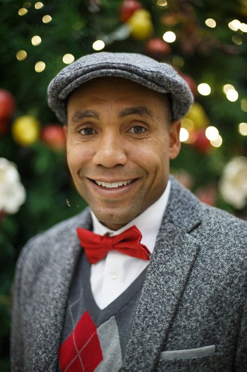 MIKE DEAL / WINNIPEG FREE PRESS
Chad Celaire, in front of the huge tree in Cityplace shopping centre, has for the last three holiday seasons rented out his vocal services, billing himself as The Christmas Singer. 
181127 - Tuesday, November 27, 2018.