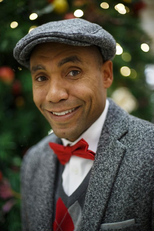 MIKE DEAL / WINNIPEG FREE PRESS
Chad Celaire, in front of the huge tree in Cityplace shopping centre, has for the last three holiday seasons rented out his vocal services, billing himself as The Christmas Singer. 
181127 - Tuesday, November 27, 2018.