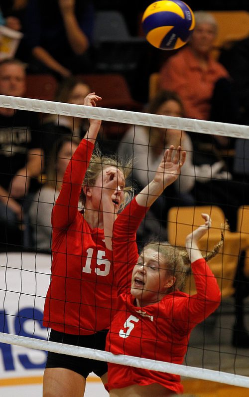 PHIL HOSSACK / WINNIPEG FREE PRESS -MBCI's #15 Alli Pauls and #5 Maren Garcia react as their blockl falls back on their side of the net.  - November 28, 2018