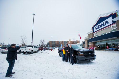 MIKAELA MACKENZIE / WINNIPEG FREE PRESS
Tammy Kondryshyn, Rona store manager (left) and Devin Cuscito, Vickar Community Chevrolet sales manager, hand winner John Shantz the keys to his new Chevrolet Silverado in Winnipeg on Thursday, Nov. 29, 2018. Shantz, a contractor, won the Three Chevrolet Silverado Giveaway Contest with a purchase of $100 or more.
Winnipeg Free Press 2018.