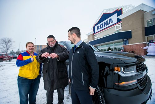 MIKAELA MACKENZIE / WINNIPEG FREE PRESS
Tammy Kondryshyn, Rona store manager (left) and Devin Cuscito, Vickar Community Chevrolet sales manager, hand winner John Shantz the keys to his new Chevrolet Silverado in Winnipeg on Thursday, Nov. 29, 2018. Shantz, a contractor, won the Three Chevrolet Silverado Giveaway Contest with a purchase of $100 or more.
Winnipeg Free Press 2018.