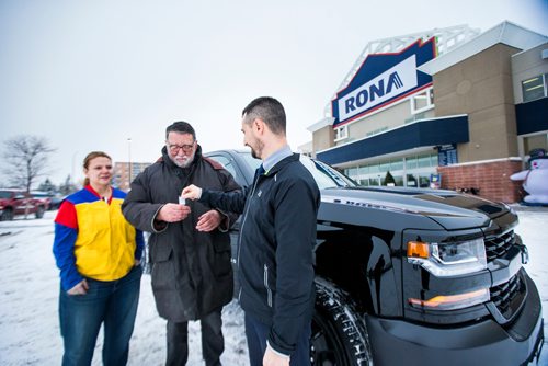 MIKAELA MACKENZIE / WINNIPEG FREE PRESS
Tammy Kondryshyn, Rona store manager (left) and Devin Cuscito, Vickar Community Chevrolet sales manager, hand winner John Shantz the keys to his new Chevrolet Silverado in Winnipeg on Thursday, Nov. 29, 2018. Shantz, a contractor, won the Three Chevrolet Silverado Giveaway Contest with a purchase of $100 or more.
Winnipeg Free Press 2018.