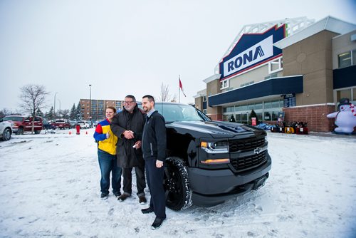 MIKAELA MACKENZIE / WINNIPEG FREE PRESS
Tammy Kondryshyn, Rona store manager (left) and Devin Cuscito, Vickar Community Chevrolet sales manager, hand winner John Shantz the keys to his new Chevrolet Silverado in Winnipeg on Thursday, Nov. 29, 2018. Shantz, a contractor, won the Three Chevrolet Silverado Giveaway Contest with a purchase of $100 or more.
Winnipeg Free Press 2018.