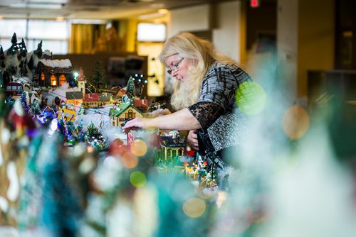 MIKAELA MACKENZIE / WINNIPEG FREE PRESS
Terry Vanoutrive adjusts the Christmas village that she builds with her husband at their residence, Fred Douglas Place, in Winnipeg on Friday, Nov. 23, 2018.
Winnipeg Free Press 2018.