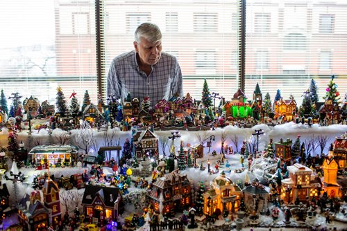 MIKAELA MACKENZIE / WINNIPEG FREE PRESS
Brian Vanoutrive takes a look at the Christmas village that he built with his wife at their residence, Fred Douglas Place, in Winnipeg on Friday, Nov. 23, 2018.
Winnipeg Free Press 2018.