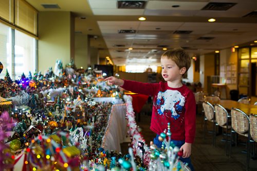 MIKAELA MACKENZIE / WINNIPEG FREE PRESS
Oscar McLaren, three, points out a scene in the massive Christmas village at Fred Douglas Place in Winnipeg on Friday, Nov. 23, 2018.
Winnipeg Free Press 2018.