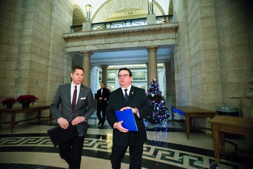 MIKAELA MACKENZIE / WINNIPEG FREE PRESS
Mayor Brian Bowman (left) and Municipal Relations Minister Jeff Wharton walk to a press conference about new provisions facilitating the disclosure and investigation of serious wrongdoing within public-sector entities at the Manitoba Legislative Building in Winnipeg on Friday, Nov. 30, 2018.
Winnipeg Free Press 2018.