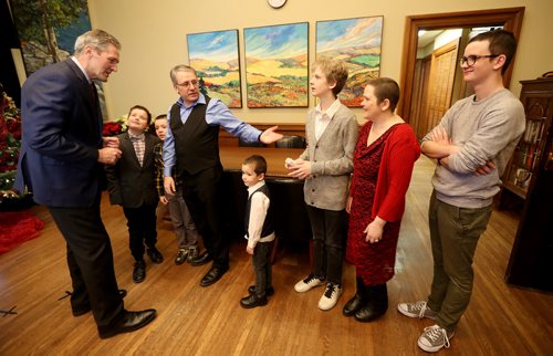 TREVOR HAGAN / WINNIPEG FREE PRESS
Premier Brian Pallister meeting with Jerome and Angela Dondo, along with some of their children, Joseph, 11, Jonathan, 9, Jathan, 5, Josiah, 16, and Joshua, 17, at the annual open house at the Manitoba Legislative Building, Saturday, December 1, 2018. Angela came to thank the premier for her ability to receive cancer treatments in the US.