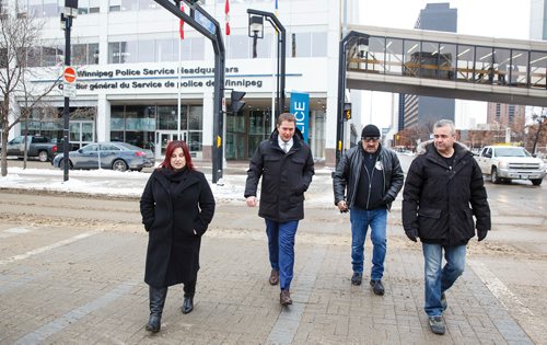 MIKE DEAL / WINNIPEG FREE PRESS
Andrew Scheer, leader of the Conservative party of Canada and Official Opposition, on a walk along Smith Street with Bear Clan members, Réjeanne Caron (left), Director of The Bear Clan and Conservative Candidate, James Favel (centre) founder of The Bear Clan citizen patrol, and Brian Chrupalo (right), Chair of the Bear Clan Board, Monday morning.
181203 - Monday, December 03, 2018.