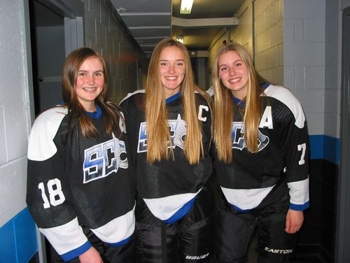 Canstar Community News Nov. 26, 2018 - Sanford Sabres (from left) assistant captain Mai Shirtliff, captain Jaclyn Keddie, and assistant captain Olivia Thompson are shown before the Sabres played against the Kelvin Clippers. The Sabres are now in CTV Division 1, the top level in the Winnipeg Women's High School Hockey League. (ANDREA GEARY/CANSTAR COMMUNITY NEWS)