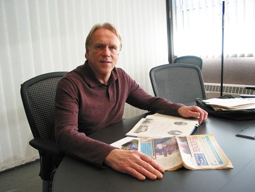 Canstar Community News Nov. 27, 2018 - Larry Taylor is shown with photos and newspaper photos of his father Dave Taylor, a longtime Headingley resident who recently died at age 98. (ANDREA GEARY/CANSTAR COMMUNITY NEWS)