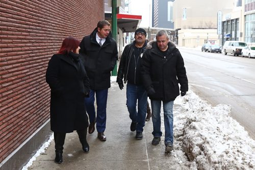 MIKE DEAL / WINNIPEG FREE PRESS
Andrew Scheer, leader of the Conservative party of Canada and Official Opposition, on a walk along Smith Street with Bear Clan members, Réjeanne Caron (left), Director of The Bear Clan and Conservative Candidate, James Favel (centre) founder of The Bear Clan citizen patrol, and Brian Chrupalo (right), Chair of the Bear Clan Board, Monday morning.
181203 - Monday, December 03, 2018.