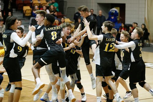 JOHN WOODS / WINNIPEG FREE PRESS
Dakota Lancers celebrate defeating the Lord Selkirk Royals in the Manitoba High School Volleyball final at the University of Manitoba Monday, December 3, 2018.