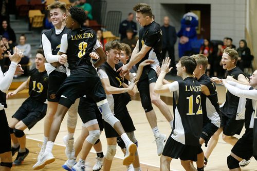 JOHN WOODS / WINNIPEG FREE PRESS
Dakota Lancers celebrate defeating the Lord Selkirk Royals in the Manitoba High School Volleyball final at the University of Manitoba Monday, December 3, 2018.