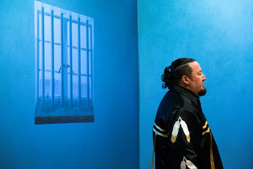 MIKAELA MACKENZIE / WINNIPEG FREE PRESS
Indigenous leader Derek Nepinak spends 27 hours fasting in an eight-foot by seven-foot replica of Nelson Mandela's jail cell as a personal journey to reflect on the parallels between the apartheid system and the experience of Indigenous people in Canada in Winnipeg on Tuesday, Dec. 4, 2018.
Winnipeg Free Press 2018.