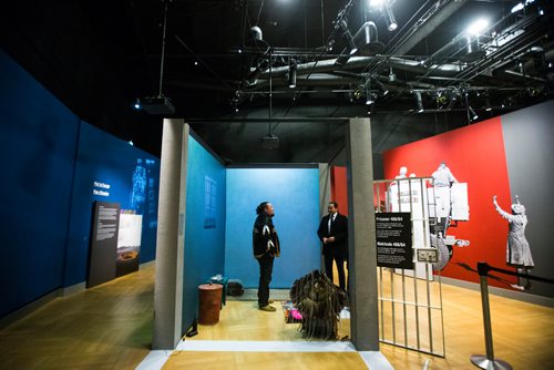 MIKAELA MACKENZIE / WINNIPEG FREE PRESS
Indigenous leader Derek Nepinak talks to provincial NDP leader Wab Kinew while spending 27 hours fasting in an eight-foot by seven-foot replica of Nelson Mandela's jail cell as a personal journey to reflect on the parallels between the apartheid system and the experience of Indigenous people in Canada in Winnipeg on Tuesday, Dec. 4, 2018.
Winnipeg Free Press 2018.