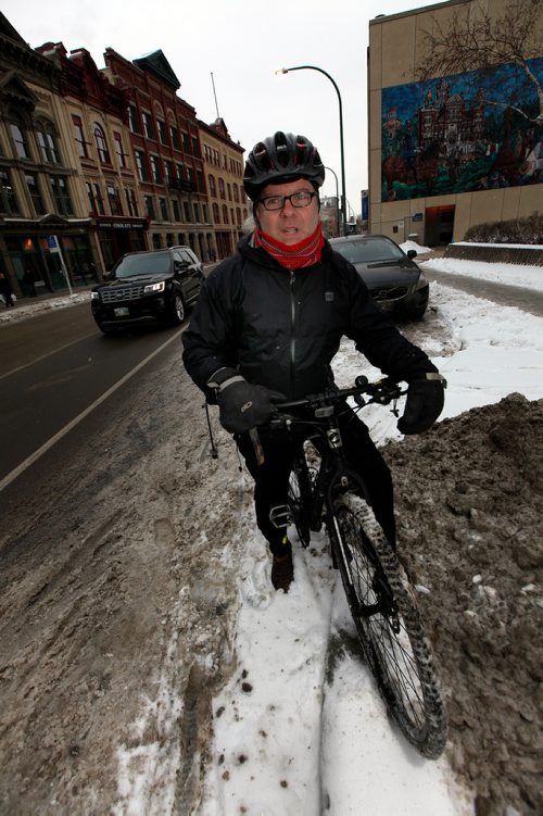 PHIL HOSSACK / WINNIPEG FREE PRESS - Mark Cohoe stops at William ave and Princess Street on his bike TUesday. See story re: Bike Lanes.  - December 4, 2018
