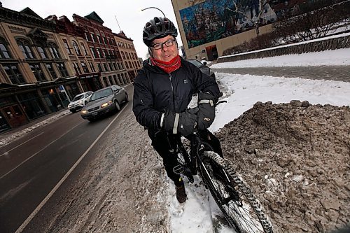 PHIL HOSSACK / WINNIPEG FREE PRESS - Mark Cohoe stops at William ave and Princess Street on his bike TUesday. See story re: Bike Lanes.  - December 4, 2018