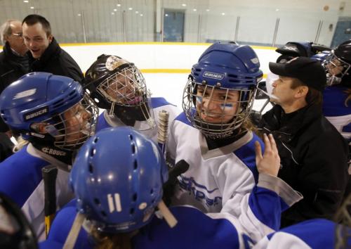 BORIS MINKEVICH / WINNIPEG FREE PRESS 090326 The Oak Park Raiders womens hockey team wins the final in sudden death overtime. Everyone congratulates #17 Robyn Fraser (looking towards the camera) after she scored the overtime goal.