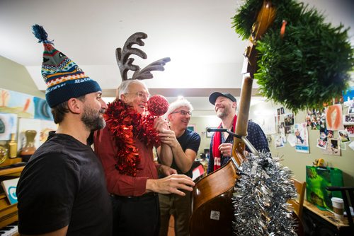 MIKAELA MACKENZIE / WINNIPEG FREE PRESS
Gilles Fournier (left), Al Simmons, Daniel Roy, and Murray Pulver try decorating Al and the bass while rehearsing for a concert series at the West End Cultural Centre in Winnipeg on Wednesday, Dec. 5, 2018.
Winnipeg Free Press 2018.