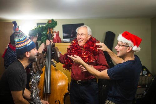 MIKAELA MACKENZIE / WINNIPEG FREE PRESS
Gilles Fournier (left), Al Simmons and Daniel Roy try decorating Al and the bass while rehearsing for a concert series at the West End Cultural Centre in Winnipeg on Wednesday, Dec. 5, 2018.
Winnipeg Free Press 2018.