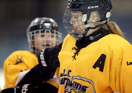 JASON HALSTEAD / WINNIPEG FREE PRESS

Lorette Scorpions defenceman Celeste Sabot (right) celebrates her goal against the College Sturgeon Heights Collegiate Huskies during Winnipeg Free Press Division 2 Winnipeg Women's High School Hockey League action on Dec. 5, 2018 at the St. James Civic Centre.