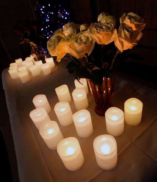 PHIL HOSSACK / WINNIPEG FREE PRESS - A dozen roses and a dozen candles to mark each of the murdered women in Manitoba this year as approximately 100 people gathered at the legislature's rotunda  Thursday evening to mark the National Day of Remembrance and Action on Violence Against Women. - December 6, 2018