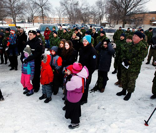 PHIL HOSSACK / WINNIPEG FREE PRESS -Approximately 50 servicemen and women gathered Thursday afternoon to witness Rabbi Noteh Glogauer, 17 Wing Chaplain Services
and 17 Wing Commander, Colonel Eric Charron,  light the central candle of the Menorah light the central candle of the Menorah - December 6, 2018