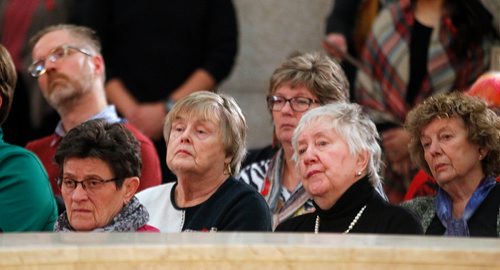 PHIL HOSSACK / WINNIPEG FREE PRESS - Attendees listen as as approximately 100 people gathered at the legislature's rotunda  Thursday evening to mark the National Day of Remembrance and Action on Violence Against Women. - December 6, 2018