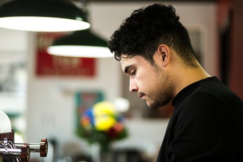 MIKAELA MACKENZIE / WINNIPEG FREE PRESS
Quinton Delorme, barista at Modern Coffee, makes drinks at the newly opened cafe at Inkster and Main in Winnipeg on Friday, Dec. 7, 2018.
Winnipeg Free Press 2018.