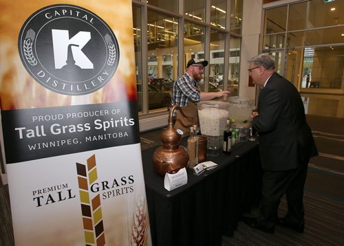 JASON HALSTEAD / WINNIPEG FREE PRESS

Capital K Distillery general manager Jesse Hildebrand serves up cocktail samplers at the 20th annual Misericordia Health Centre Foundation Gala on Oct. 11, 2018 at the RBC Convention Centre Winnipeg. (See Social Page)