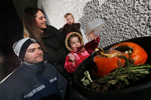 JOHN WOODS / WINNIPEG FREE PRESS
Lynn and Mark Campbell and their children Lucy and Sophie, 3, are photographed composting at their house Monday, December 10, 2018.