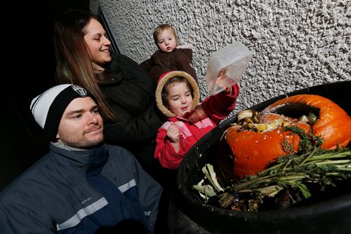 JOHN WOODS / WINNIPEG FREE PRESS
Lynn and Mark Campbell and their children Lucy and Sophie, 3, are photographed composting at their house Monday, December 10, 2018.